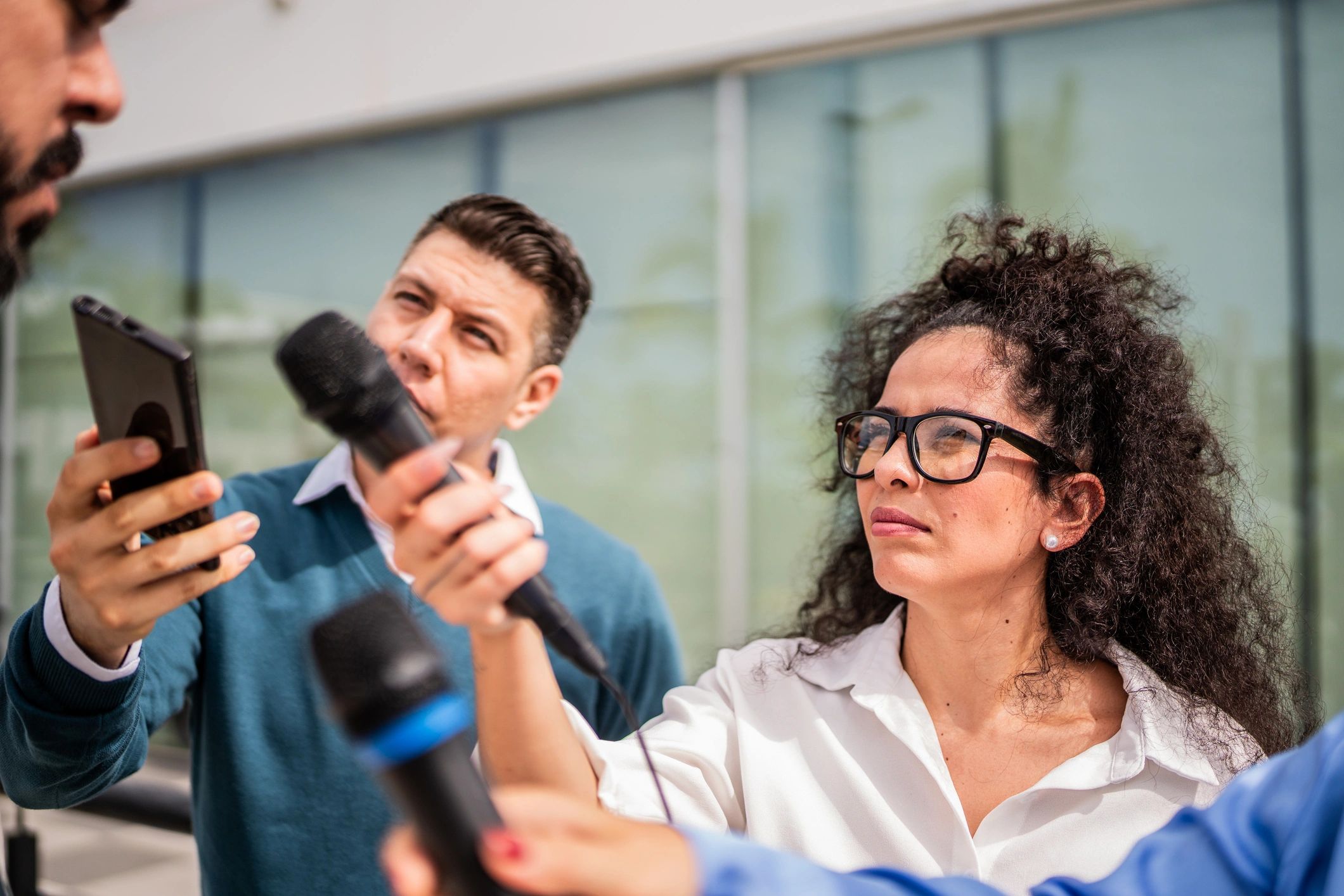 Journalists gathering information for a sports story