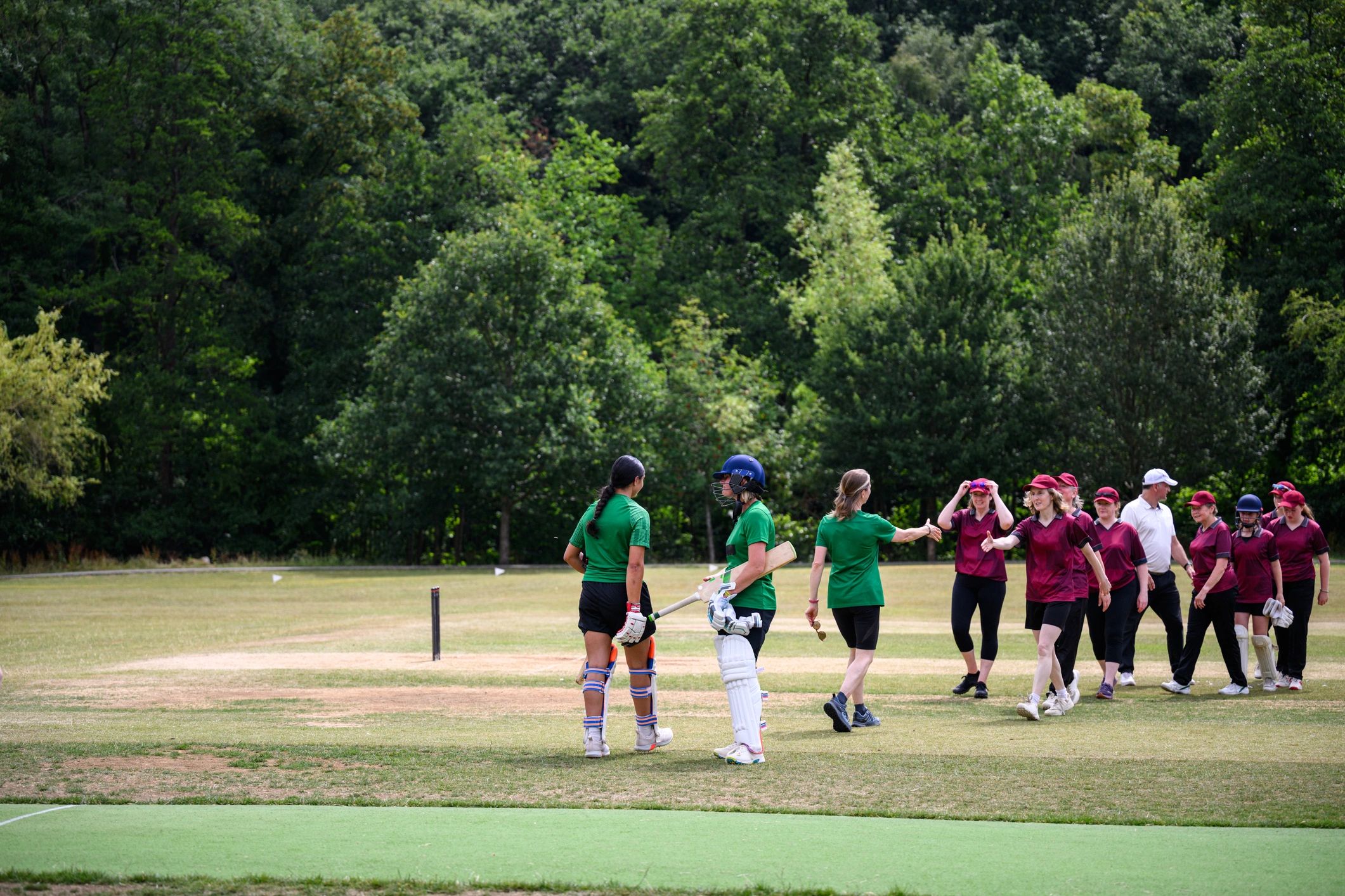 Players congratulating each other after a match