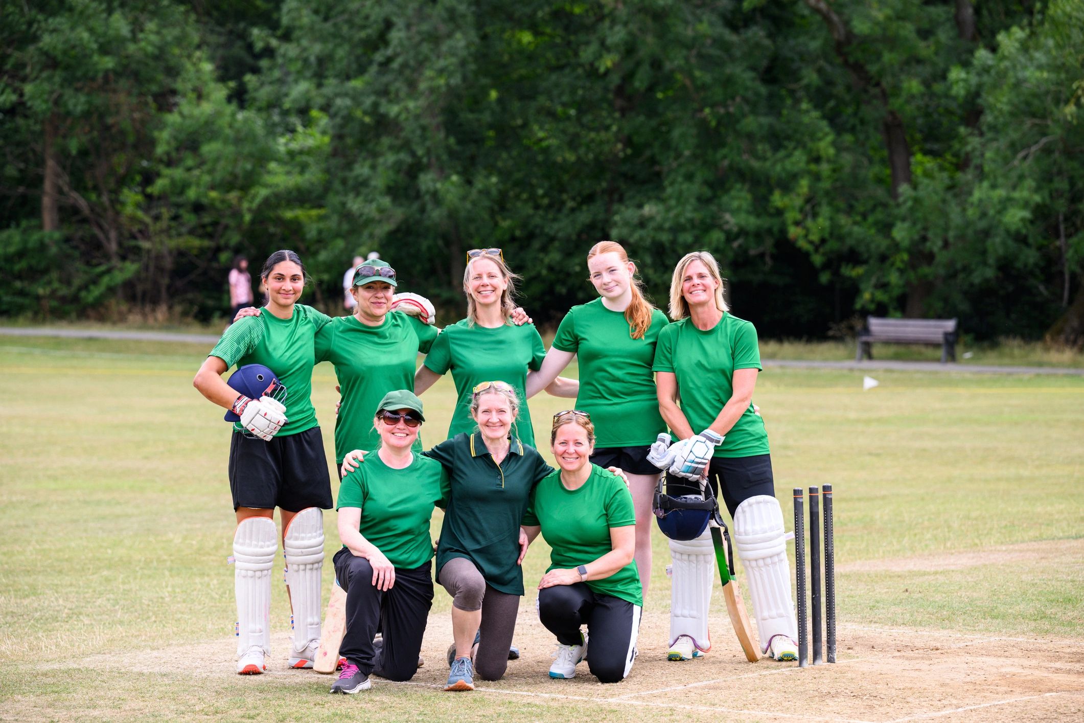 Team athletes gathered on a sports field